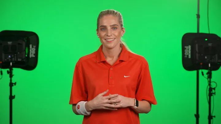 Talent filmed in front of a green screen before compositing